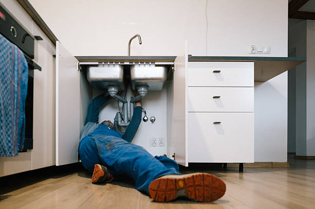 Professional Emergency Plumber technician working in Knightstown, IN